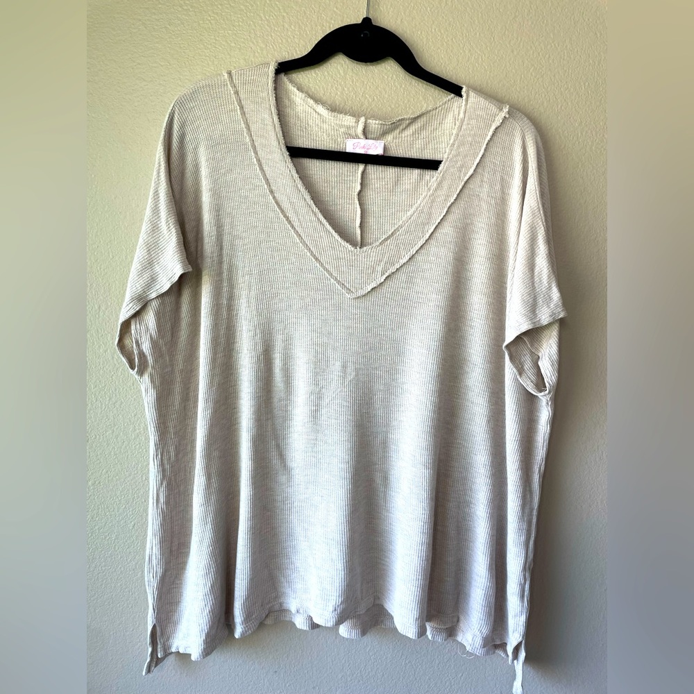 Pink Lily size medium women’s tee.